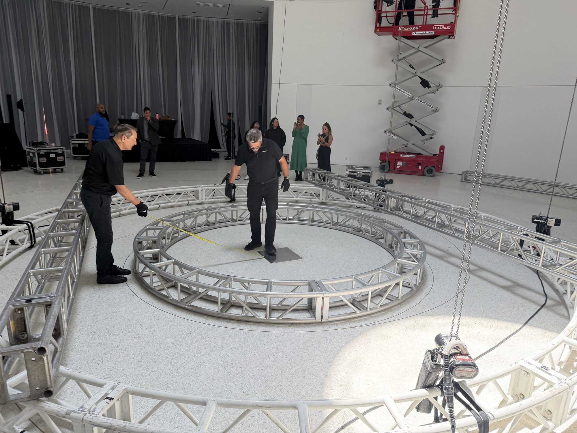 Crew setting the truss ring on the floor under the dome at Faena Miami Beach