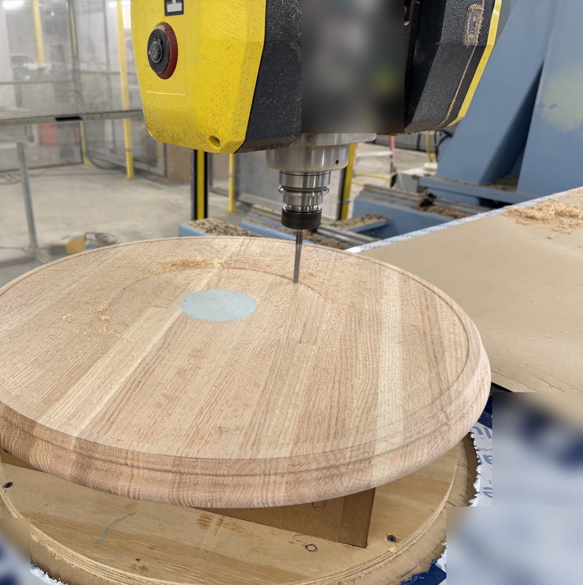 CNC cutting the recess for a brass top in a solid oak table, for Sip & Guzzle, West Village, New York