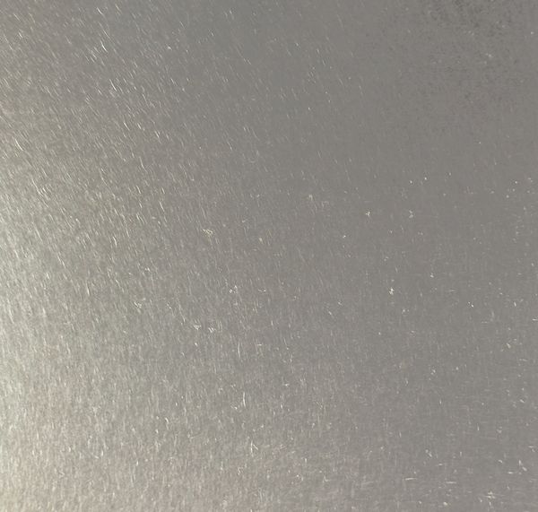 Zinc finish sample, no texture, light patina