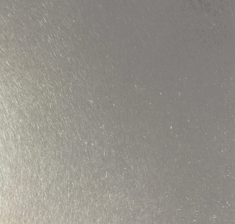 Zinc finish sample, no texture, light patina